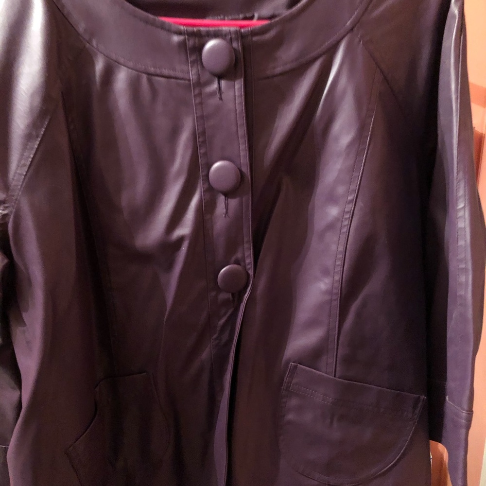 Purple leather jacket new with out tags size 2x